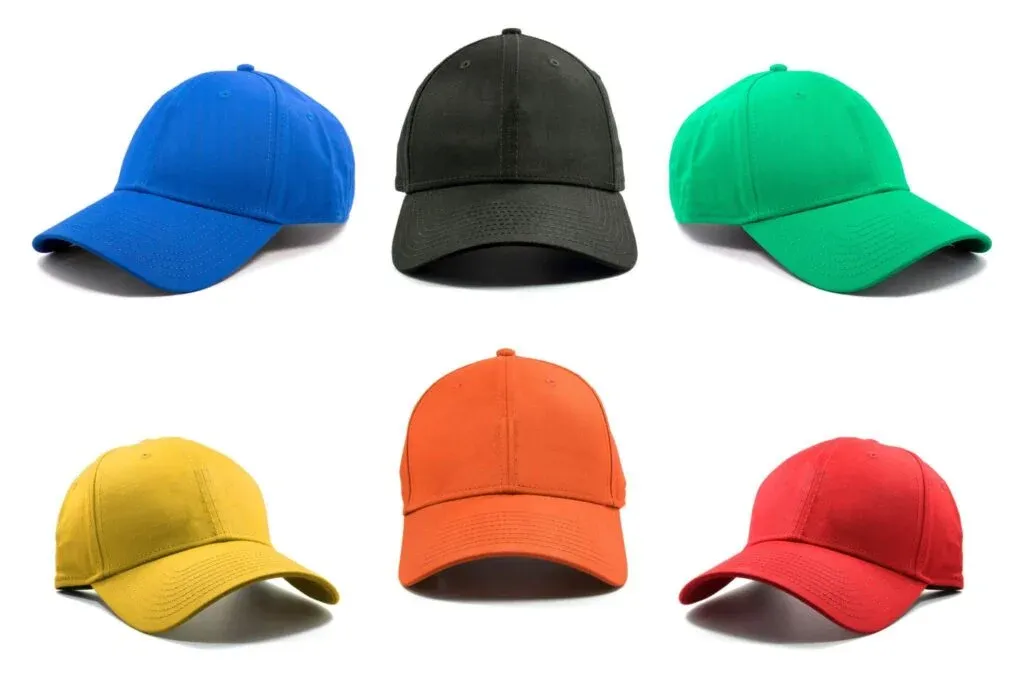 Six vibrant baseball caps in blue, black, green, yellow, orange, and red on white background.