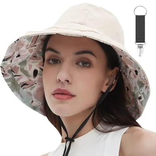Woman wearing reversible beige and floral wide-brimmed sun hat with chin strap.