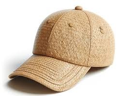 Light brown woven straw baseball cap with curved brim on white background.