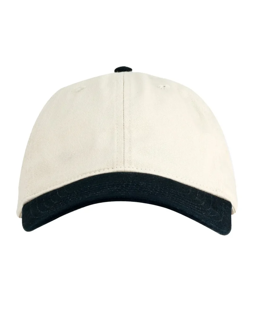 Front view of beige and black two-tone baseball cap on white background.