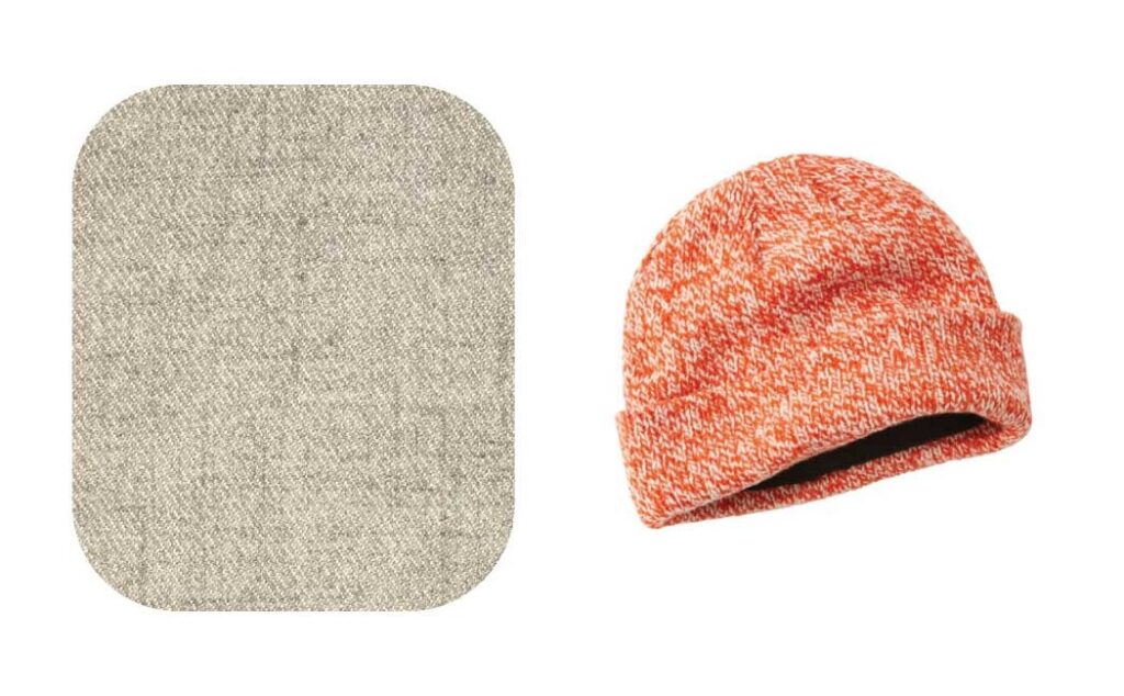 Orange wool knit hat and fabric close-up