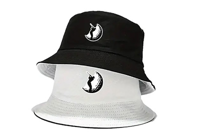 Black and white reversible bucket hat with moon and cat embroidery.