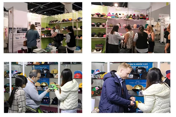 People browsing and discussing hats at trade show booths.