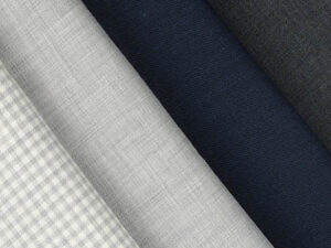 A selection of fabric swatches in various textures and colors.