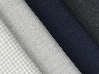 A selection of fabric swatches in various textures and colors.