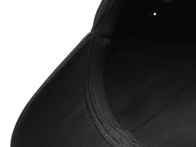 Close-up view of the inside of a black baseball cap showing stitching details.