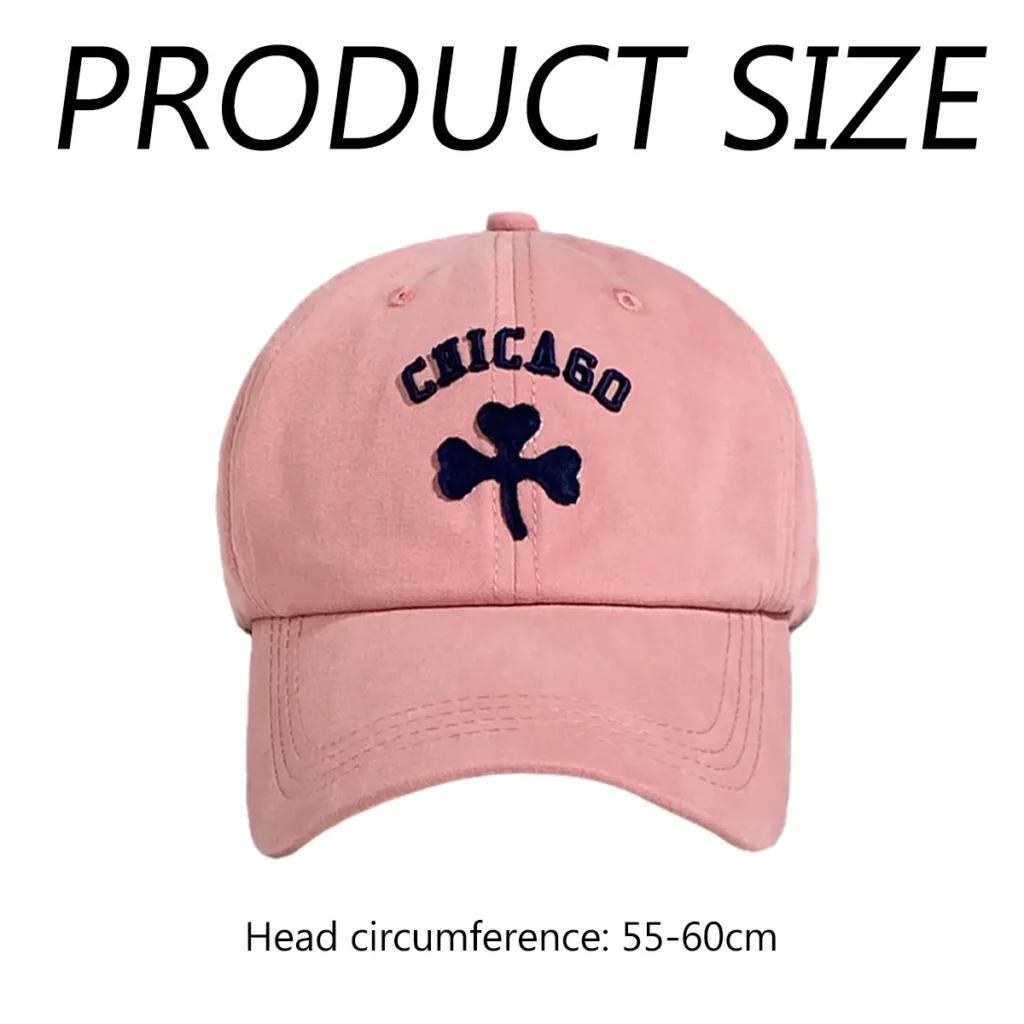 Pink baseball cap with navy blue Chicago text and clover embroidery