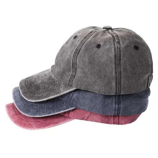 Three vintage-style baseball caps stacked in gray, blue, and red