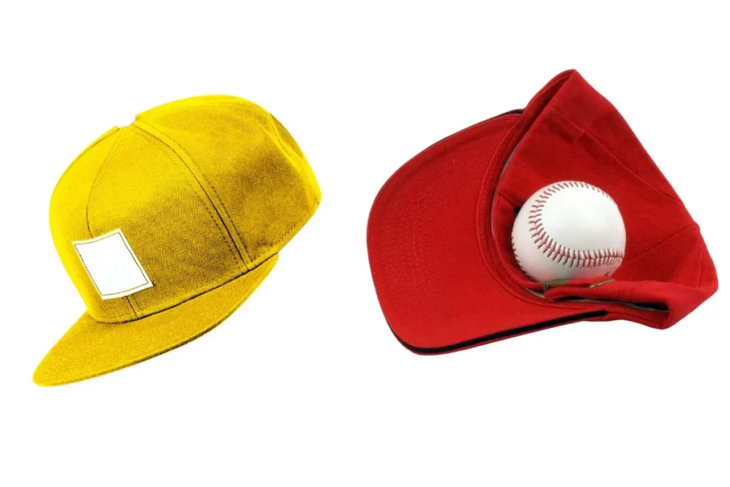 Yellow baseball cap and red cap holding a baseball on white background.