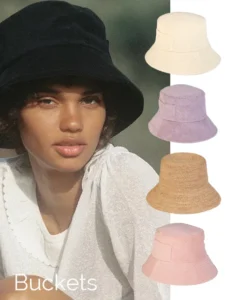 Woman wearing black bucket hat with four additional color options shown.