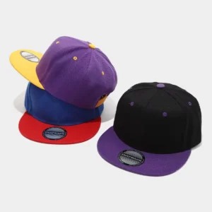 Multi-colored snapback hats with flat brims, stacked in pairs on white background.