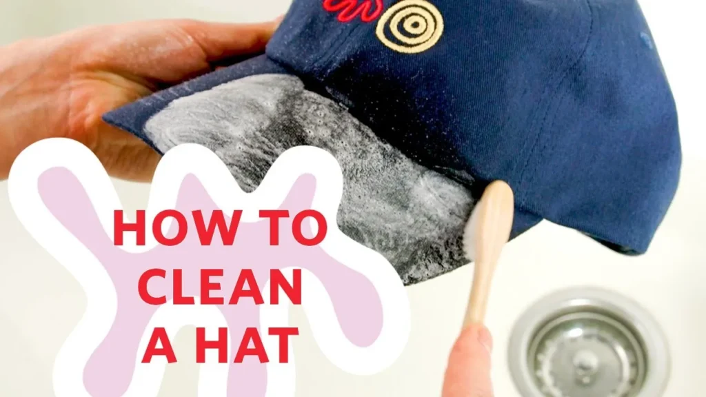 Brim cleaning with brush and foam on blue hat