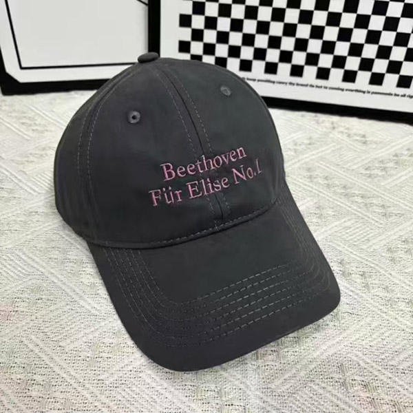Black baseball cap with pink embroidered text "Beethoven Für Elise No.1" on front.