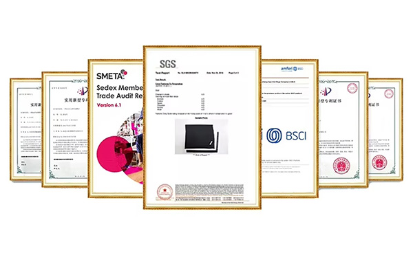 Framed certificates including audit reports and patents.