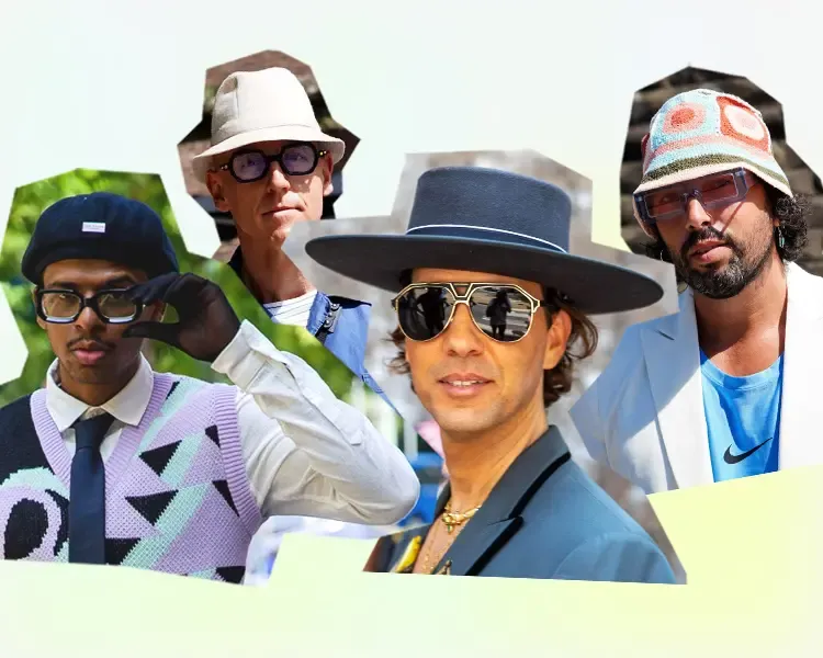 Four men wearing diverse fashionable hats and sunglasses in outdoor setting